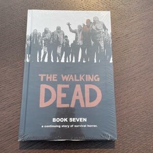 The Walking Dead hardcover graphic novel - Book Seven. New unopened.